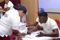 Participants registering for the Flood Early Warning Stakeholders Workshop